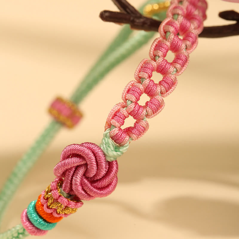 ATELIER-TIBET – Bracelet Fil Rouge Fleur de Pêcher Tressé (Nœud Symbolique)