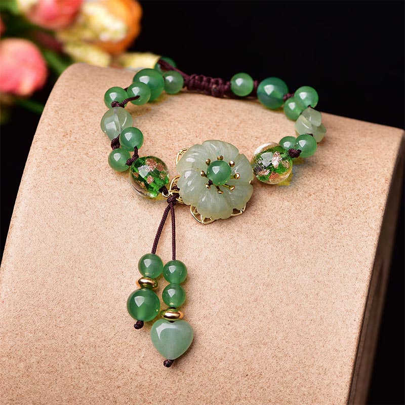 ATELIER-TIBET – Bracelet Porte-Bonheur en Jade Vert & Fleur Symbolique | Harmonie & Épanouissement