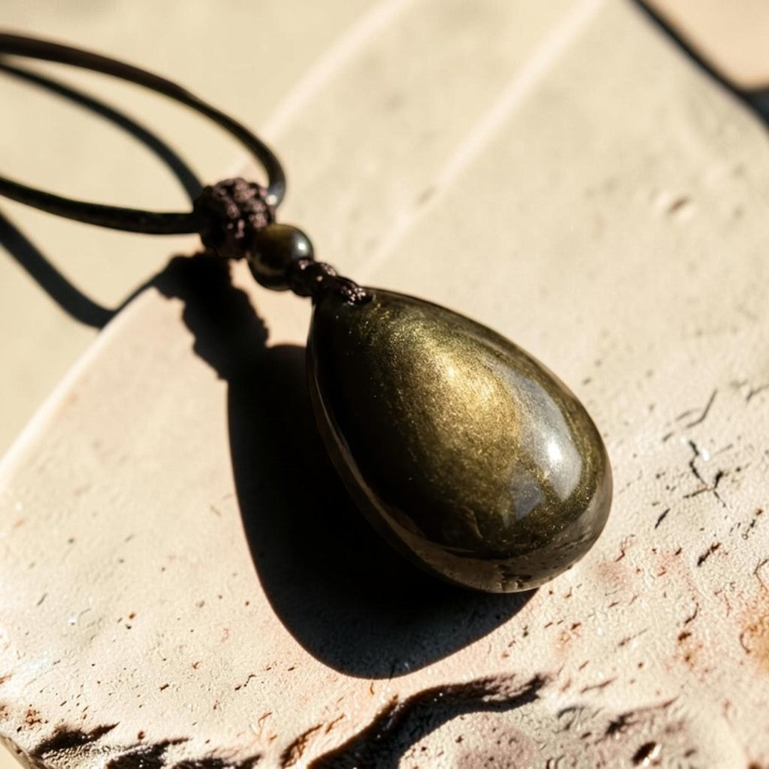 ATELIER-TIBET – Pendentif Goutte “Force Intérieure” en Obsidienne Dorée