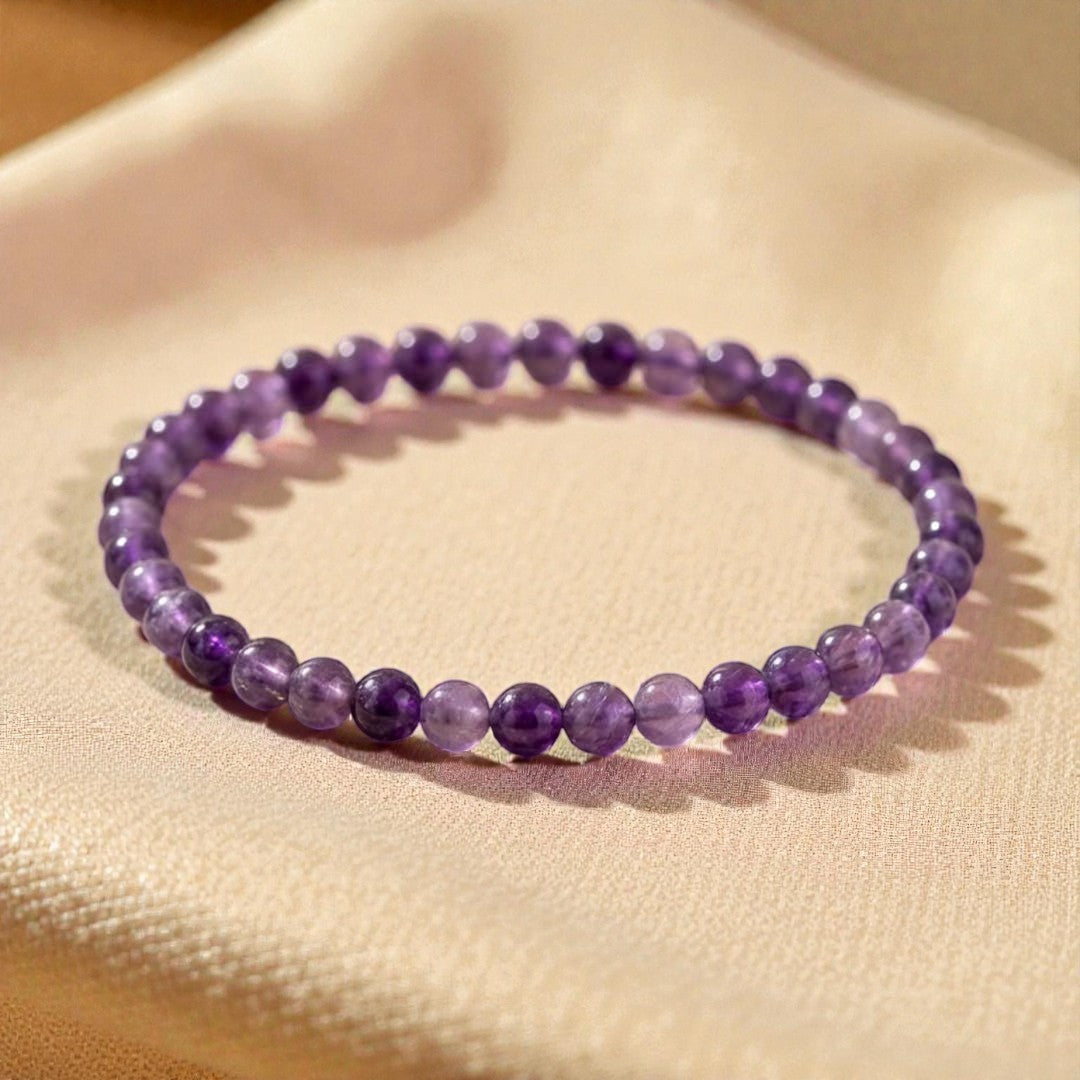 Atelier Tibet amethyst beaded bracelet with 4mm natural stones on elastic cord.