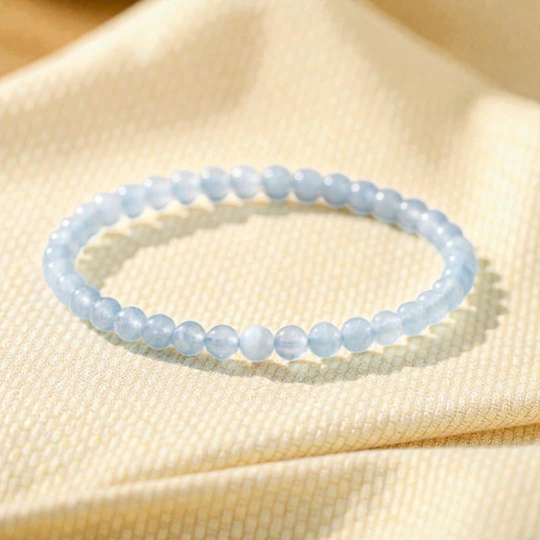 Atelier Tibet light blue aquamarine beaded bracelet, 4mm natural stones, elastic cord, minimalist style.