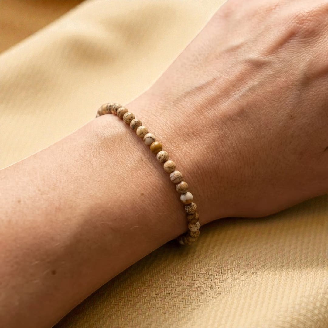 Atelier Tibet fine bracelet with 4mm natural Jasper beads, earthy tones, elasticated for comfortable wear.