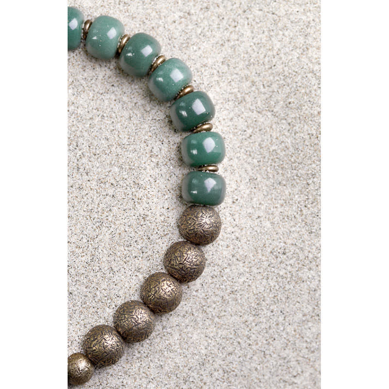 ATELIER-TIBET Bracelet Graines de Bodhi & Cuivre – 6×8 mm