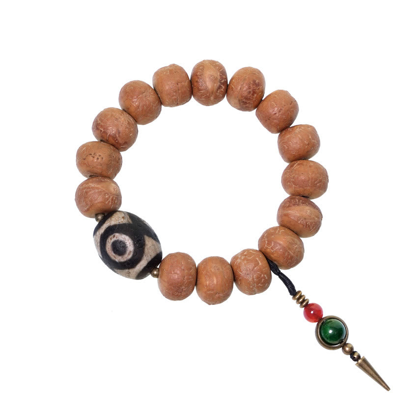 ATELIER-TIBET Bracelet Mala Bodhi 14 mm et Perles Dzi Artisanales La force symbolique des graines sacrées
