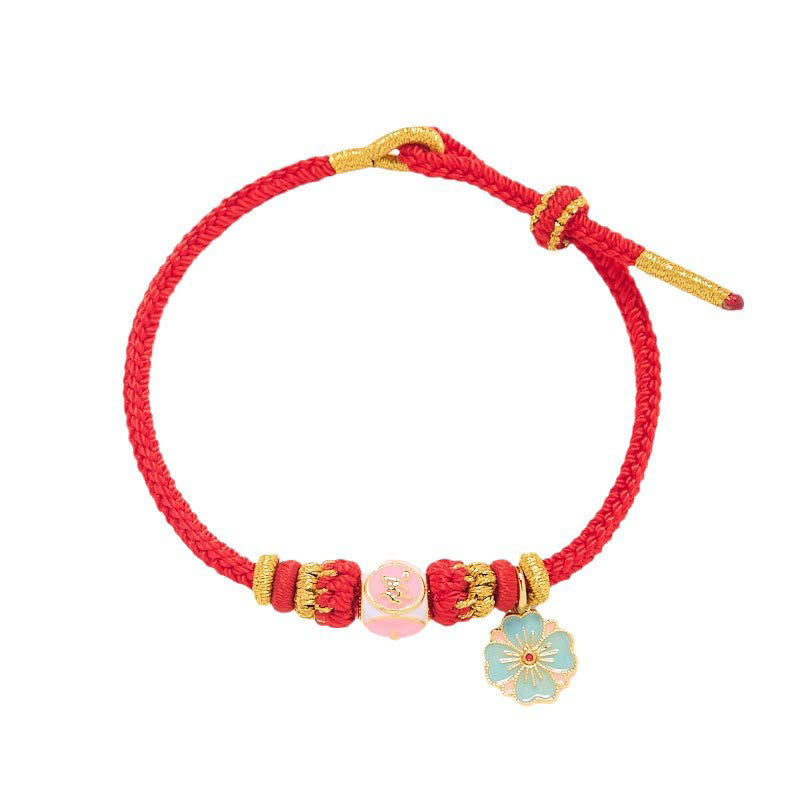 ATELIER-TIBET – Bracelet de Protection Fleur de Pêcher en Cuivre Plaqué Or & Fil Rouge