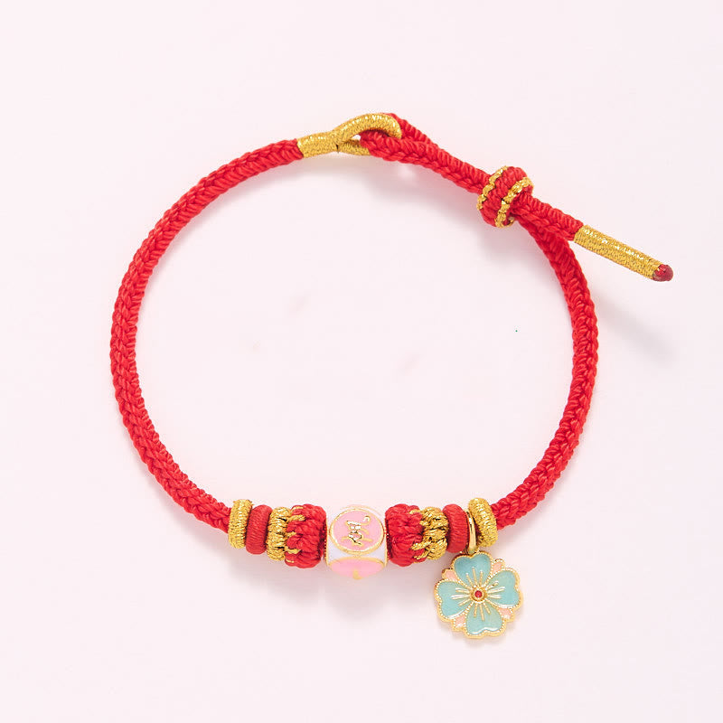 ATELIER-TIBET – Bracelet de Protection Fleur de Pêcher en Cuivre Plaqué Or & Fil Rouge