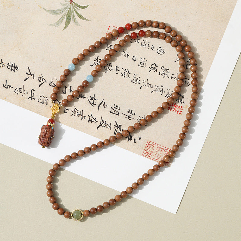 ATELIER-TIBET Bracelet Mala en Bois de Santal Ancien – Symboles Sacrés & Pierres Naturelles