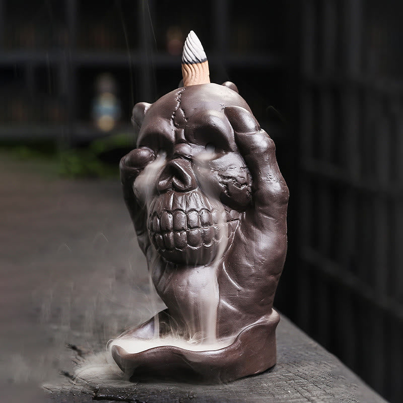 ATELIER-TIBET Brûleur d'encens spirituel en argile violette avec tête de mort et main fantôme en Buddha Stones