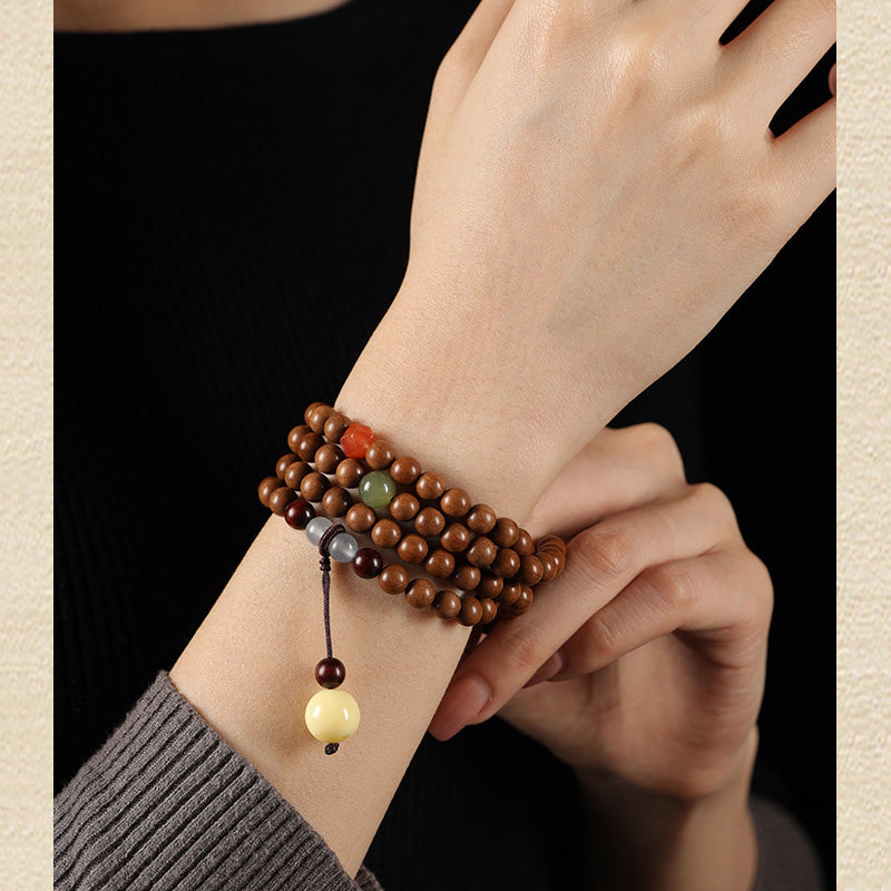 ATELIER-TIBET Bracelet Mala en Bois de Santal Ancien – Symboles Sacrés & Pierres Naturelles