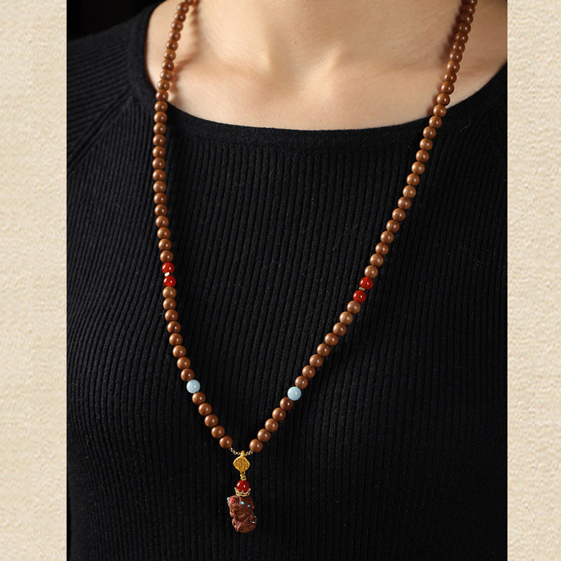 ATELIER-TIBET Bracelet Mala en Bois de Santal Ancien – Symboles Sacrés & Pierres Naturelles