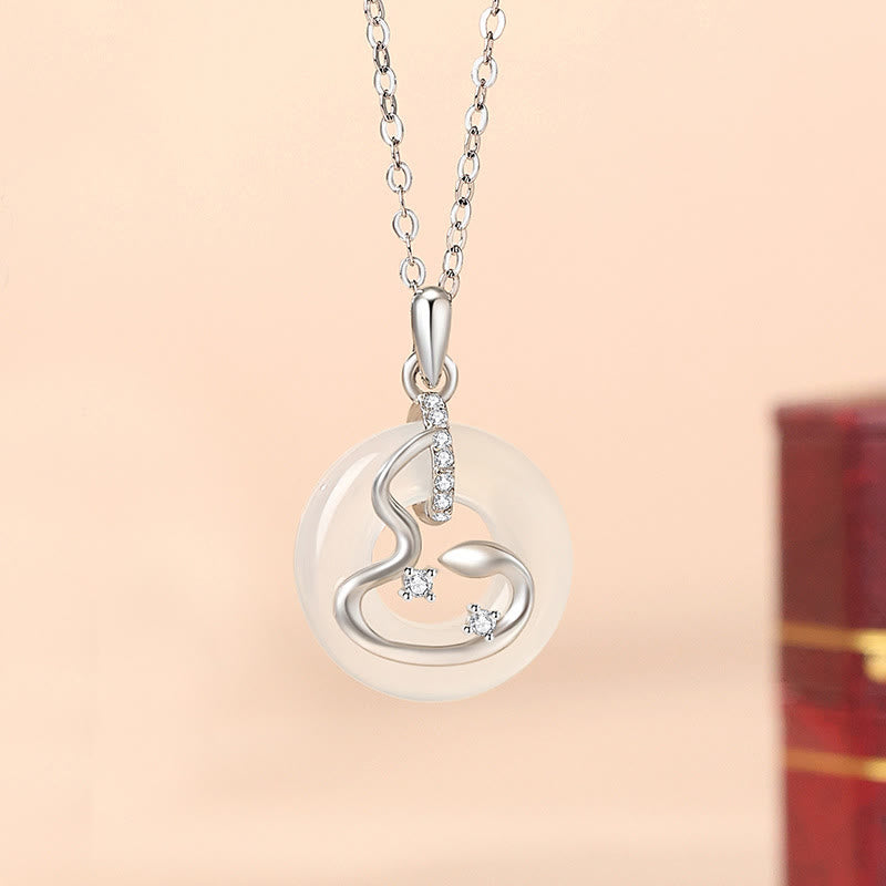 ATELIER-TIBET – Pendentif Boucle de Paix en Argent 925 & Onyx Noir ou Calcédoine