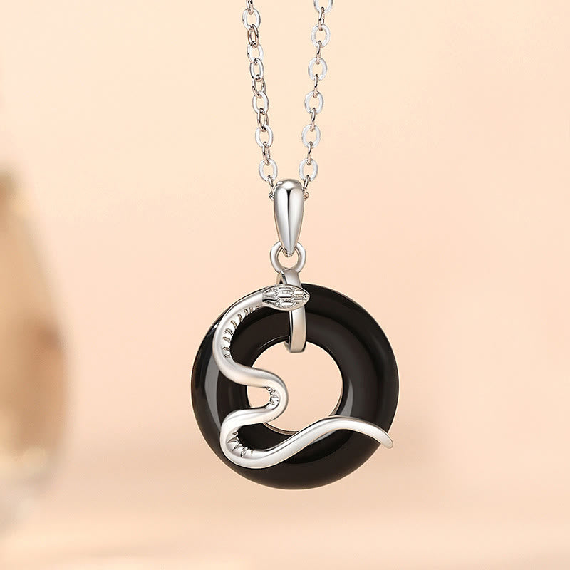 ATELIER-TIBET – Pendentif Boucle de Paix en Argent 925 & Onyx Noir ou Calcédoine