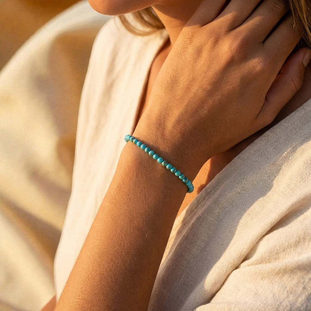 Atelier Tibet fine turquoise beaded bracelet with 4mm natural stones on elastic cord.