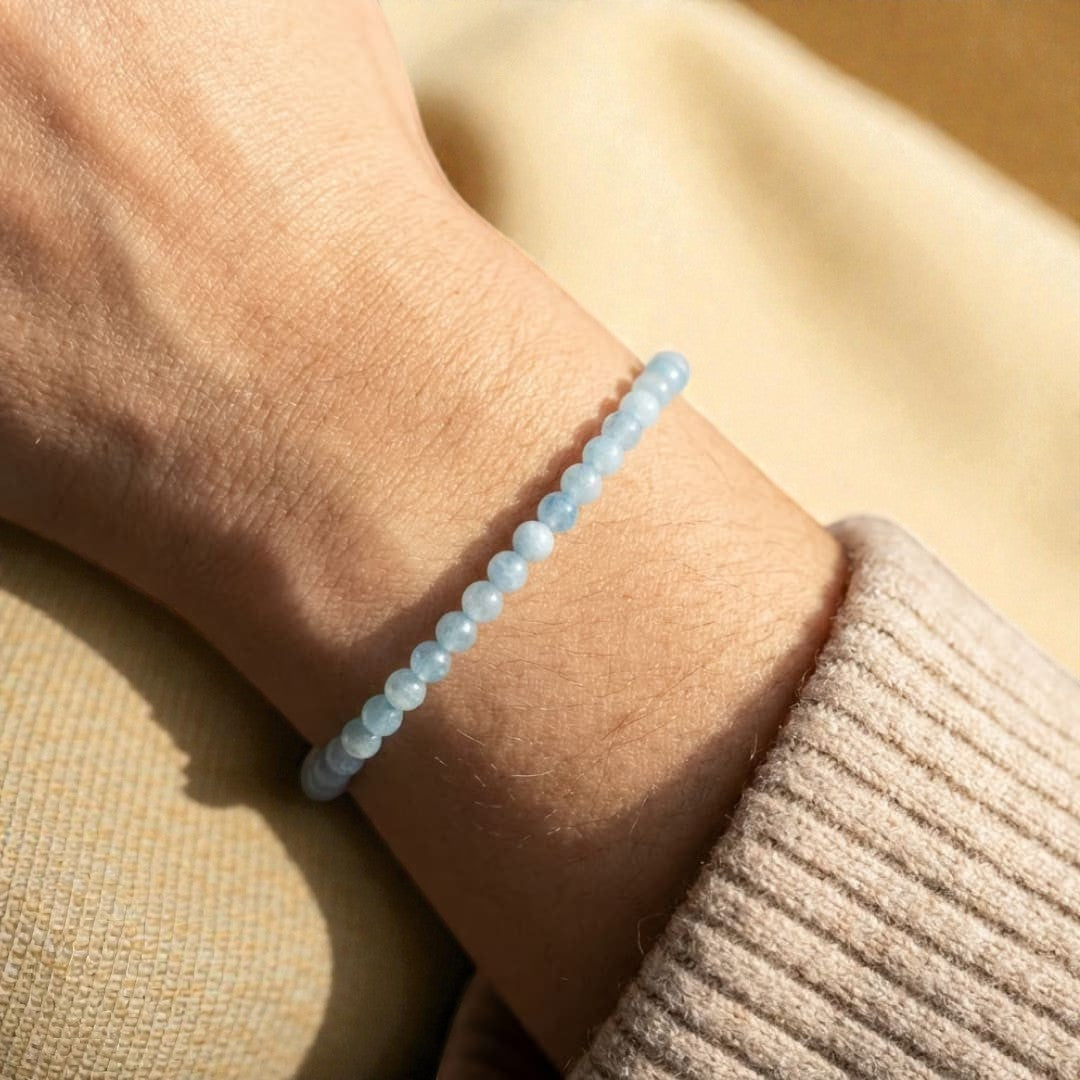 Atelier Tibet light blue aquamarine beaded bracelet, 4mm natural stones on elastic cord.
