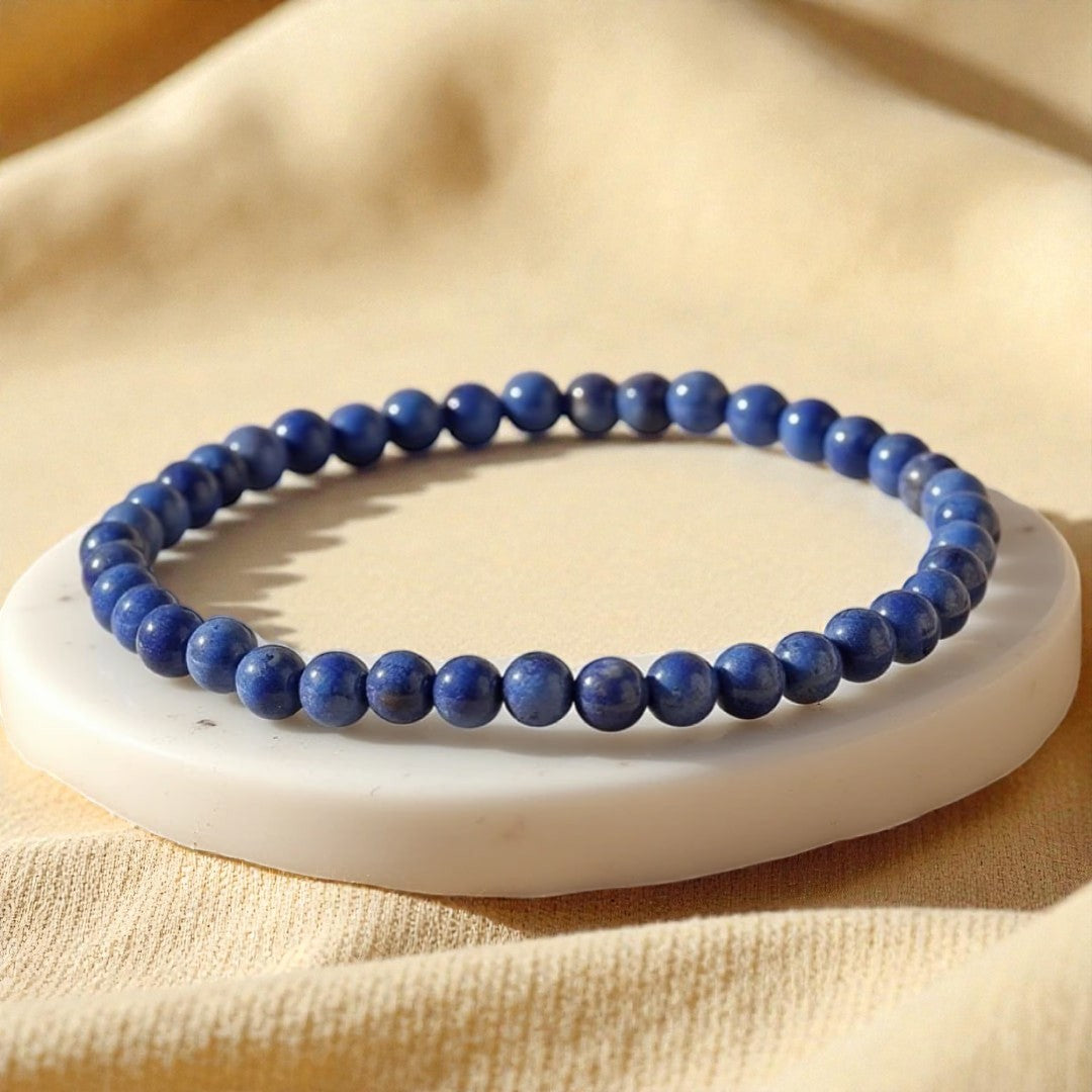 Atelier Tibet blue lapis lazuli beaded bracelet with 4mm natural stones on elastic cord.
