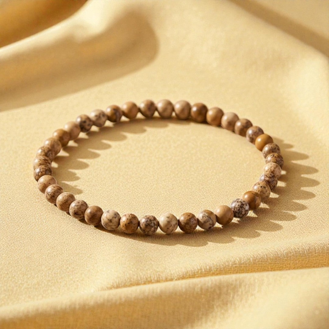 Atelier Tibet fine bracelet with 4mm natural Jasper stone beads on elastic cord.