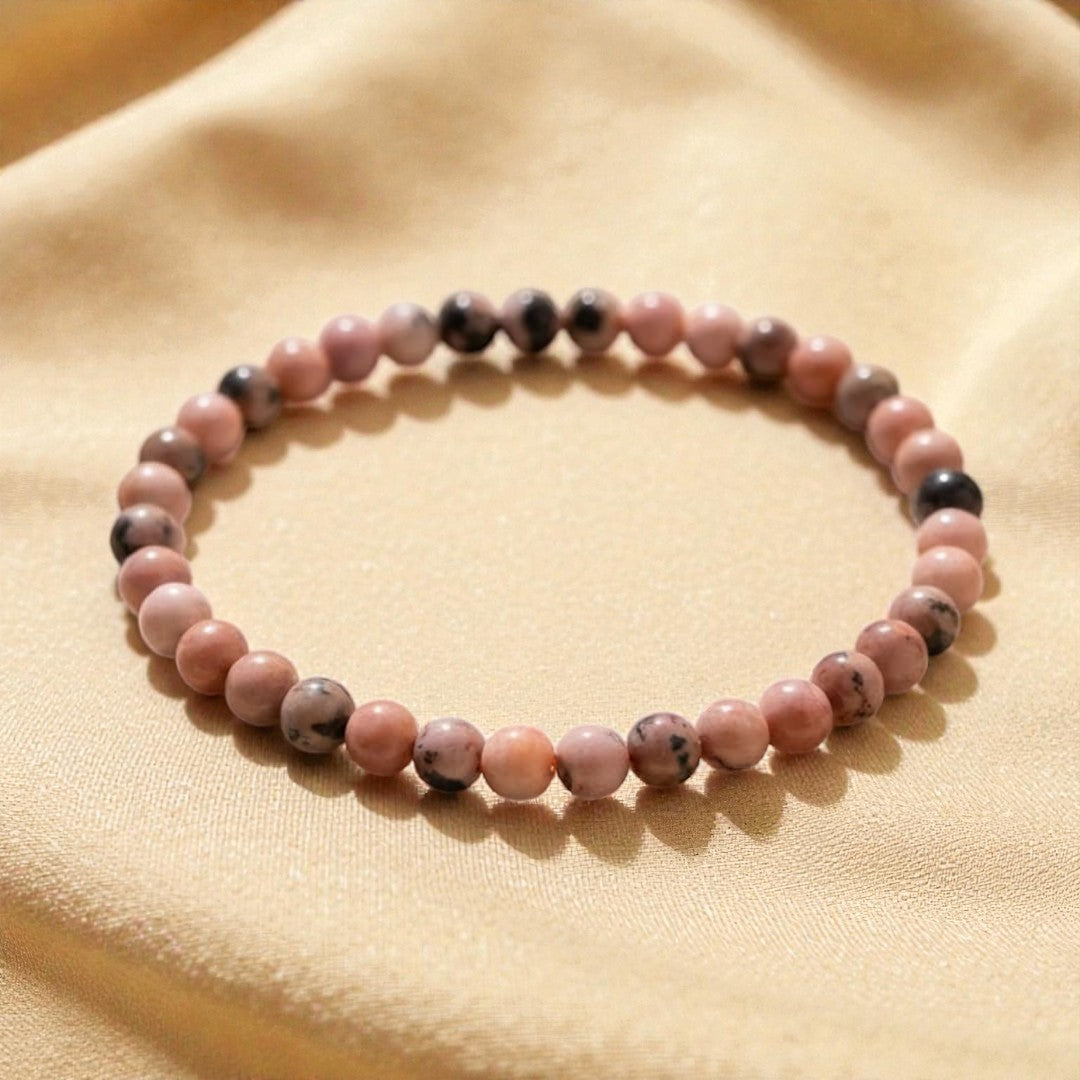 Atelier Tibet delicate pink rhodonite beaded bracelet, 4mm natural stones on elastic cord.