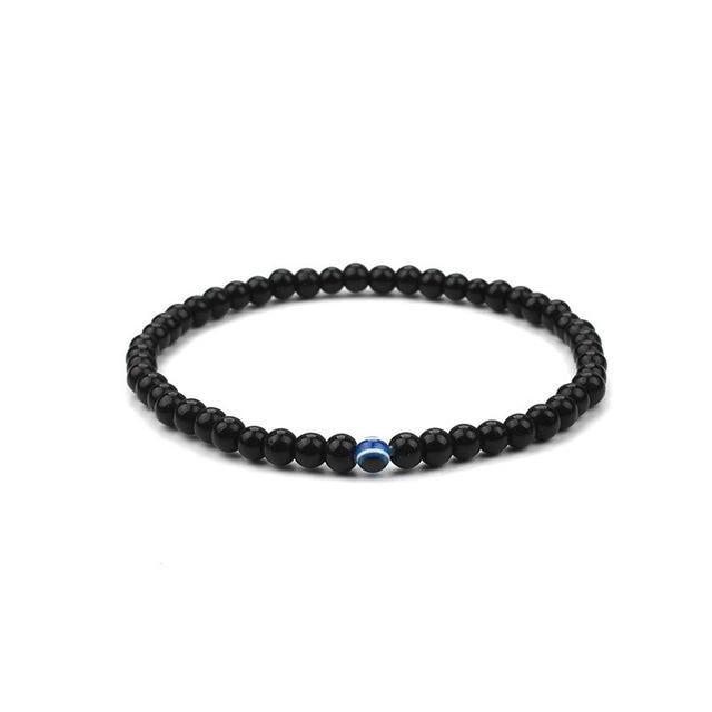 ATELIER-TIBET – Bracelet en Onyx Noir & Symbole du Mauvais Œil (Perles 4 mm)
